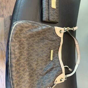 One of Michael Kors Favorites! This bag is a very nice size with matching wallet